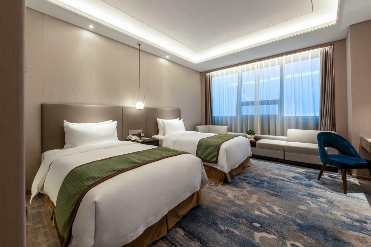 Auto City Ruili Hotel Jiading Екстер'єр фото